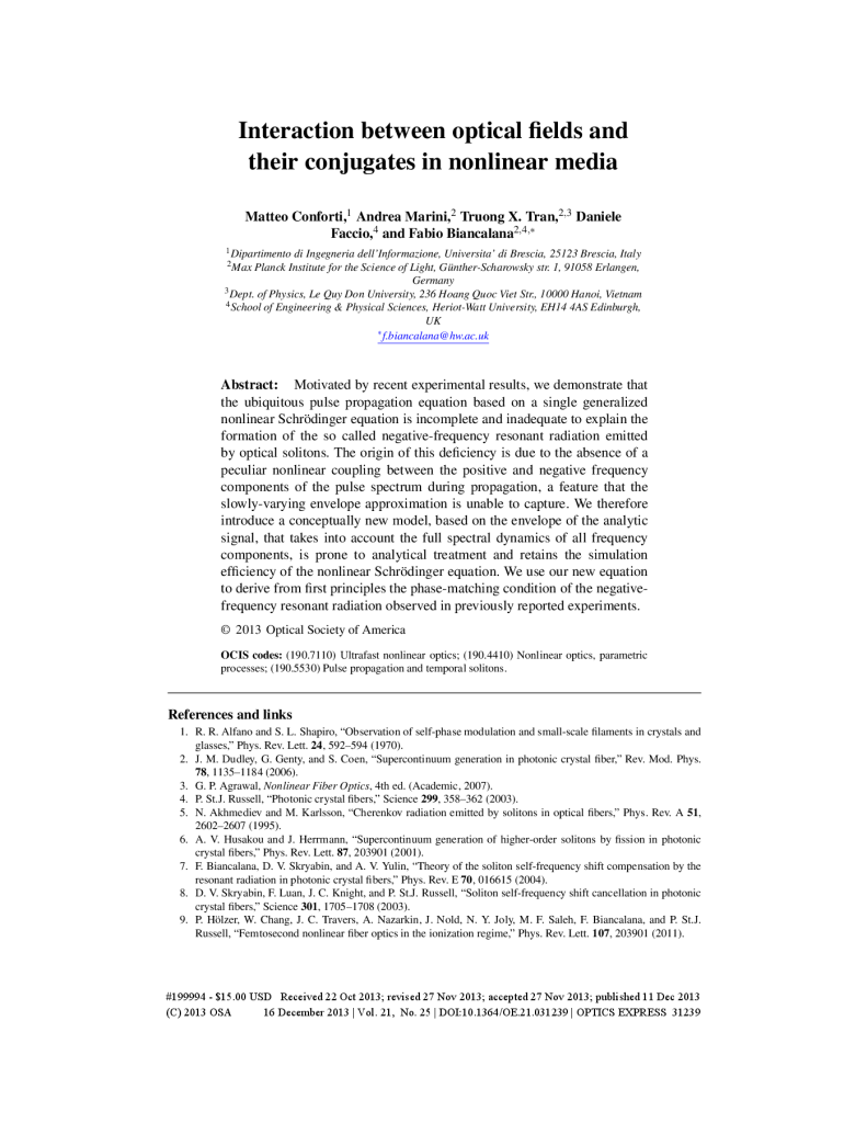 Interaction between optical fields and their conjugates in nonlinear media