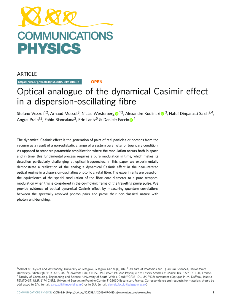 Optical analogue of the dynamical Casimir effect in a dispersion-oscillating fibre