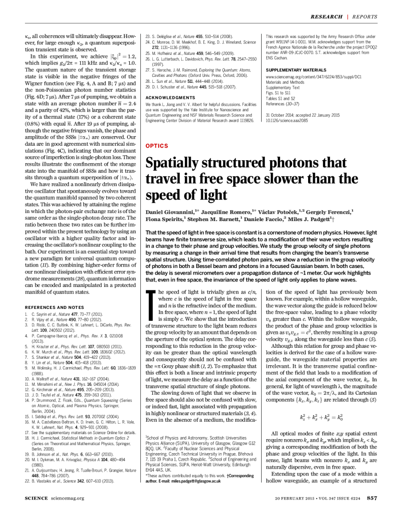 Spatially structured photons that travel in free space slower than the speed of light